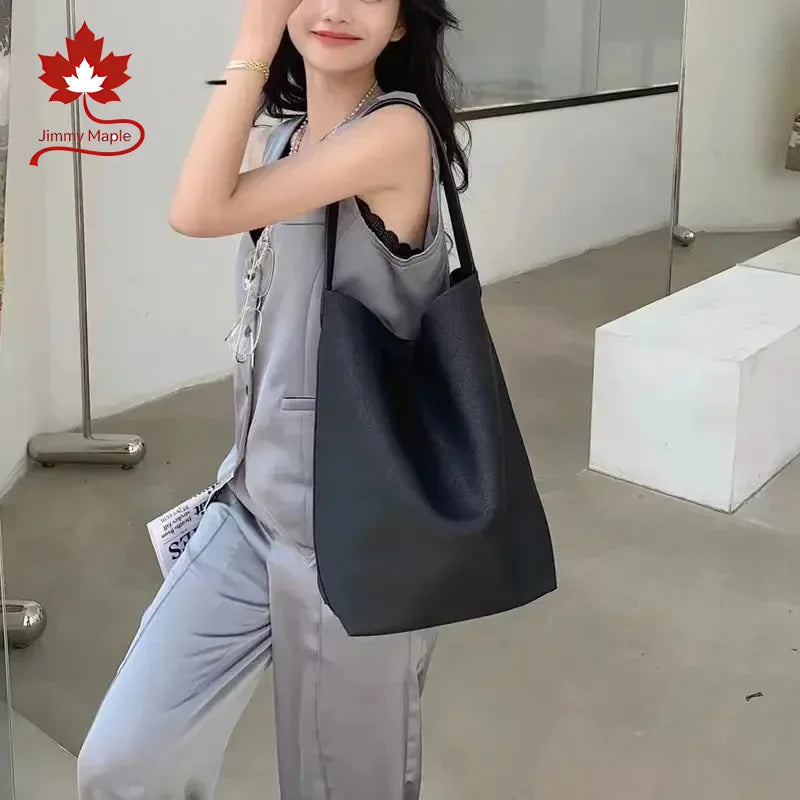 Valentina Tela Small bucket bag in Grey, back view