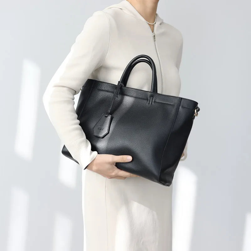 Valentina Torre Small crossbody bag in Elephant Grey, worn