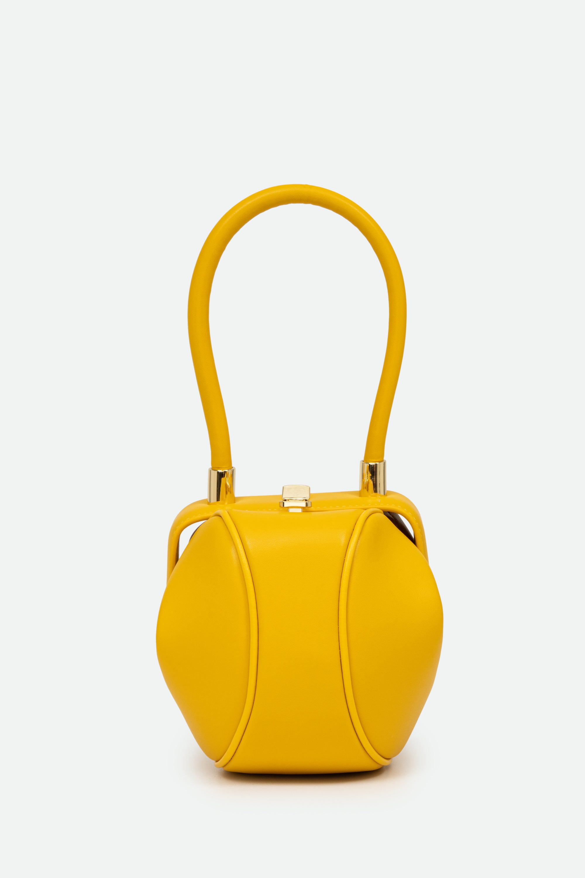 Yellow handbag with a handle on a white background
