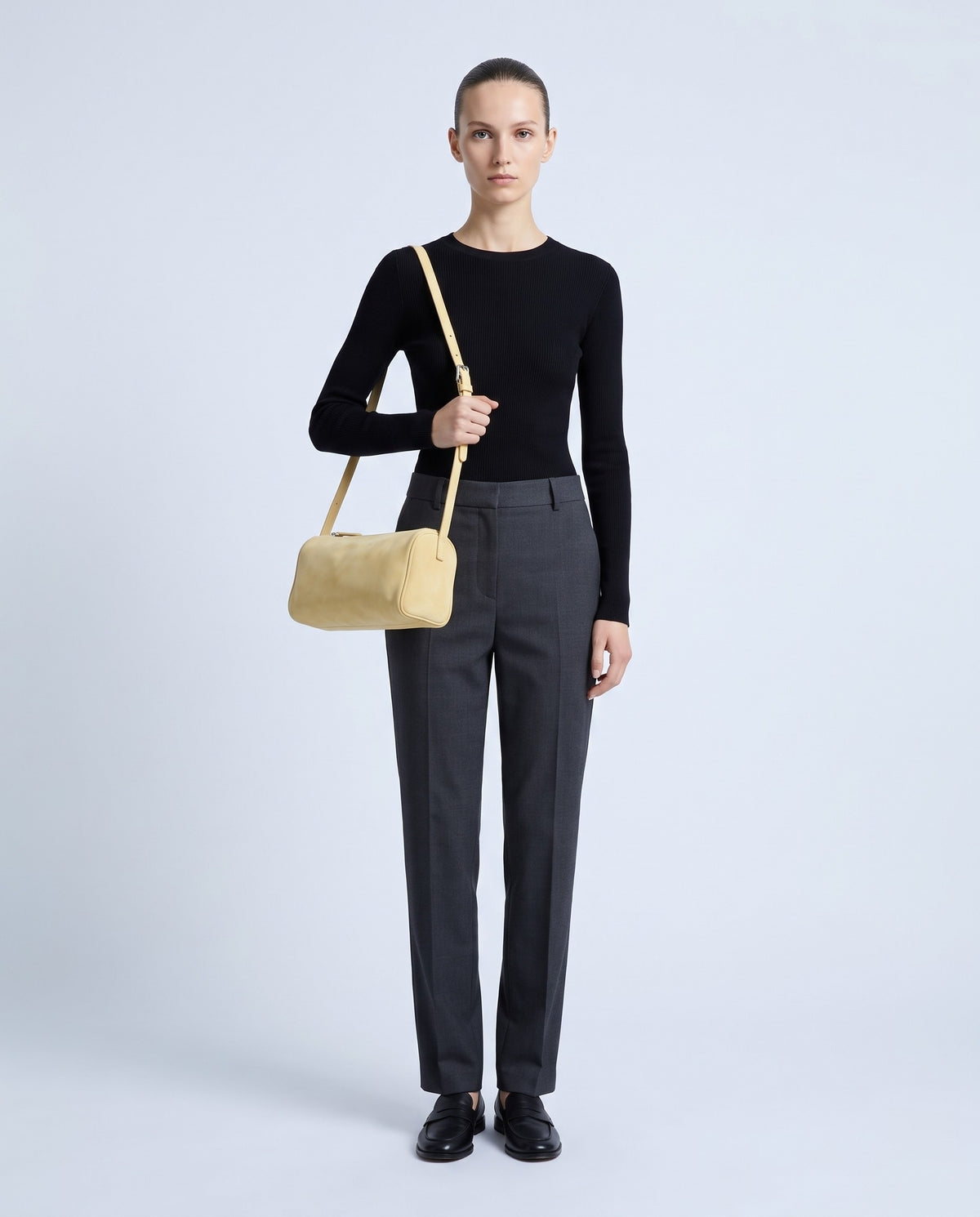 Model wearing the Alba barrel shoulder bag in Butter suede – full length