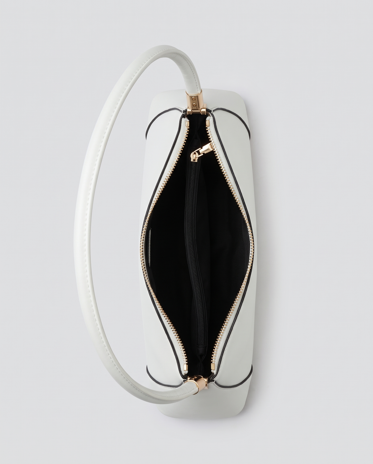 Arc leather shoulder bag in Chalk – inside view with the zip open