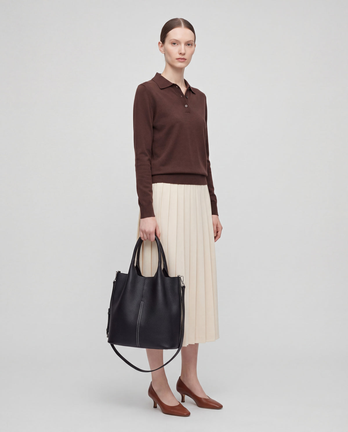 Arco bag in Black – worn by model, full length