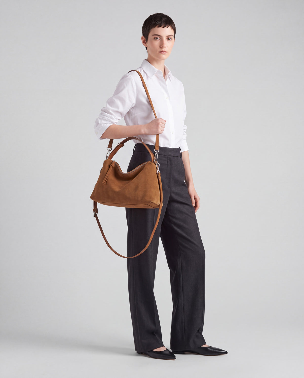 Ardesia bag in Caramel – worn by model, full length