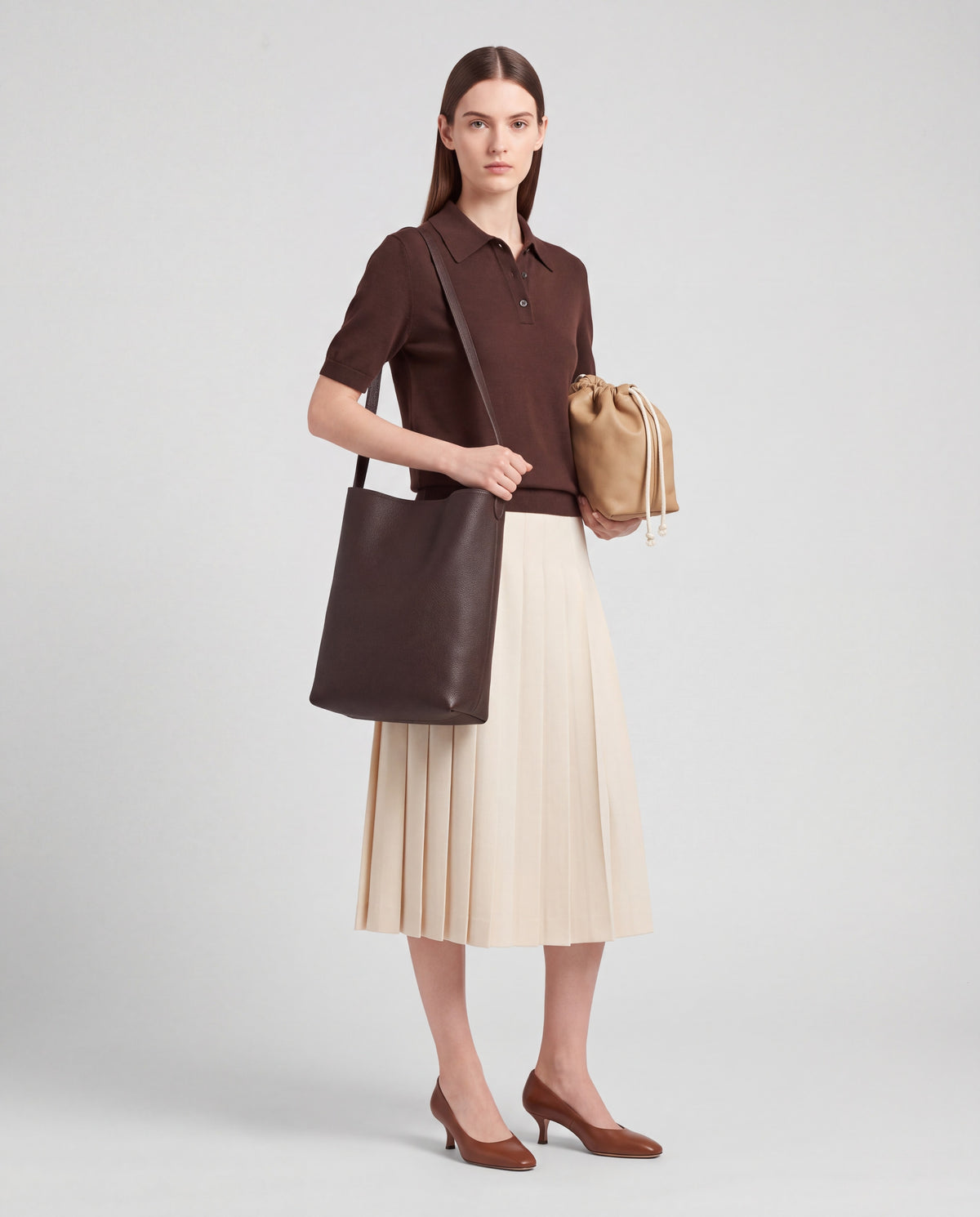 Aria Medium bag in Chocolate – worn by model, full length