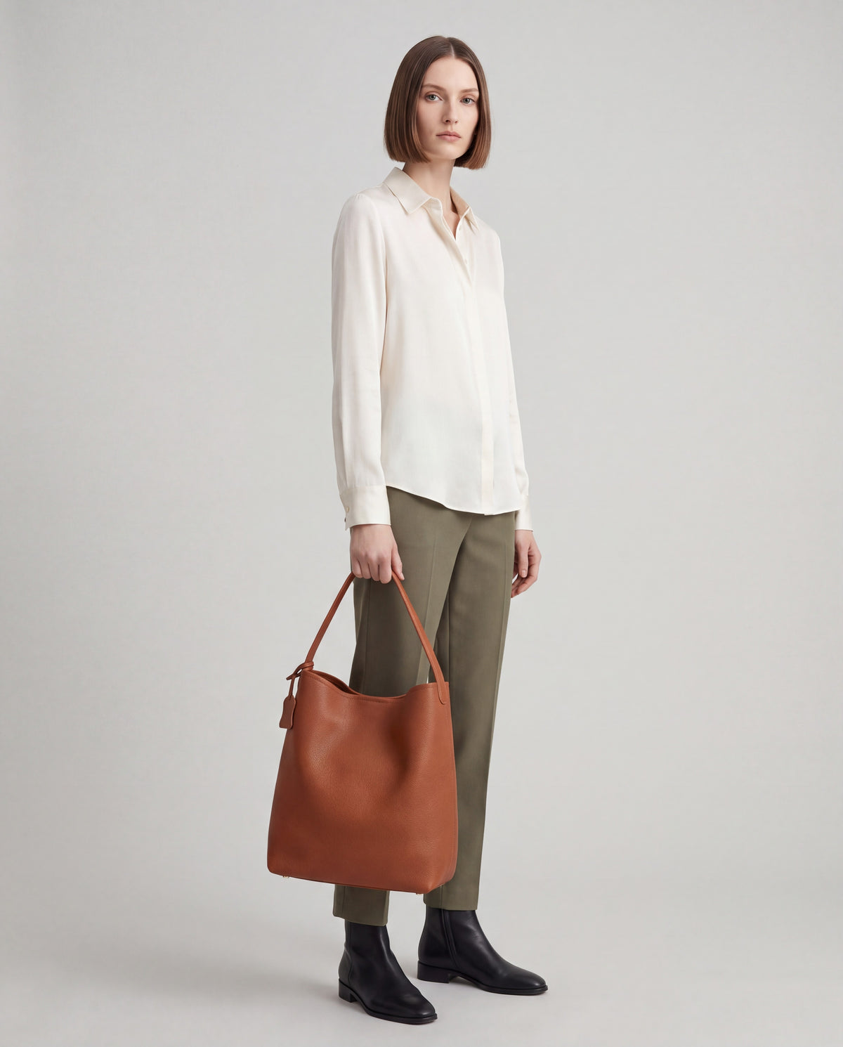Aria Large bag in Cognac – worn by model, full length