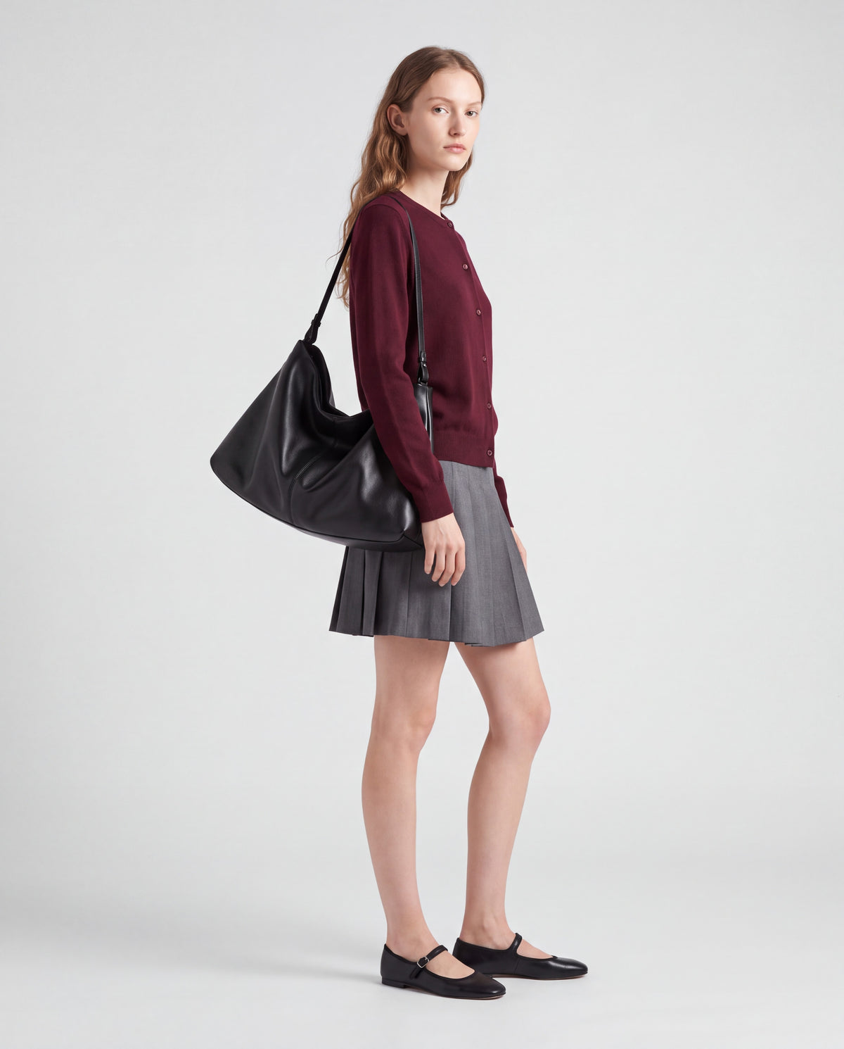 Assisi bag in Black – worn by model, full length