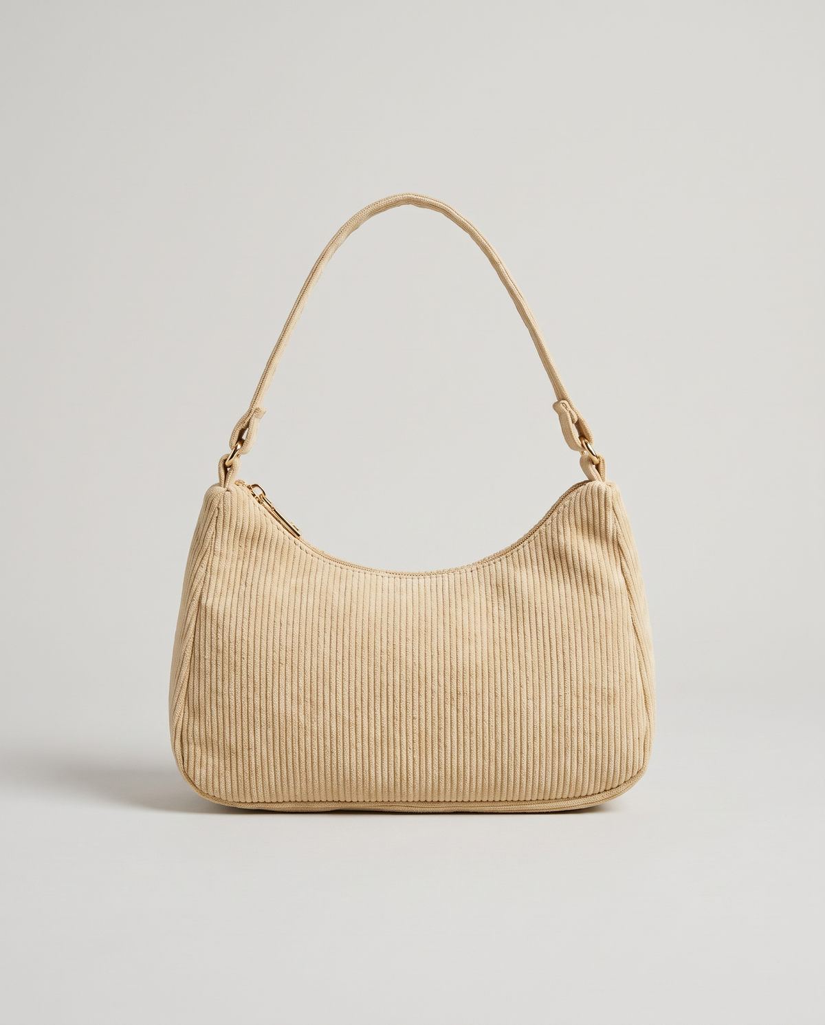 Aura corduroy shoulder bag in Beige – front view