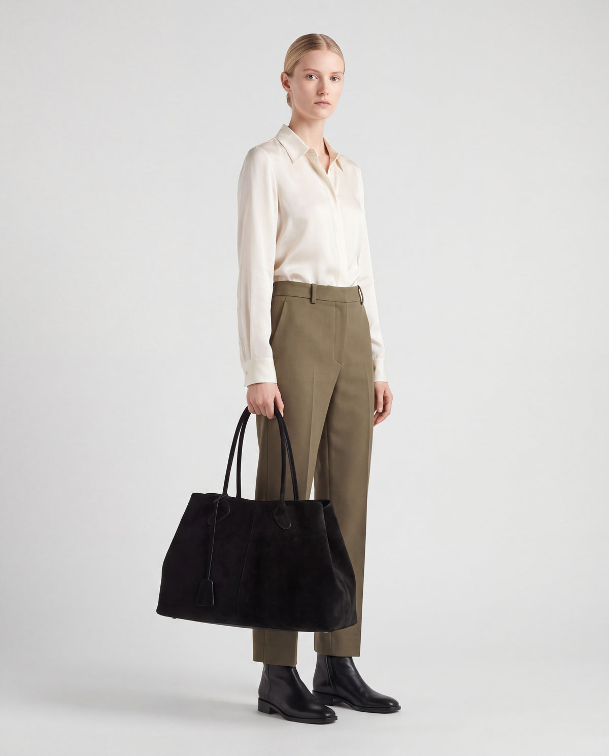 Bello bag in Black – worn by model, full length