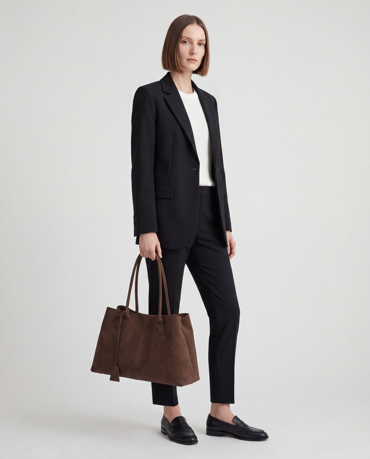 Bello bag in Brown – worn by model, full length