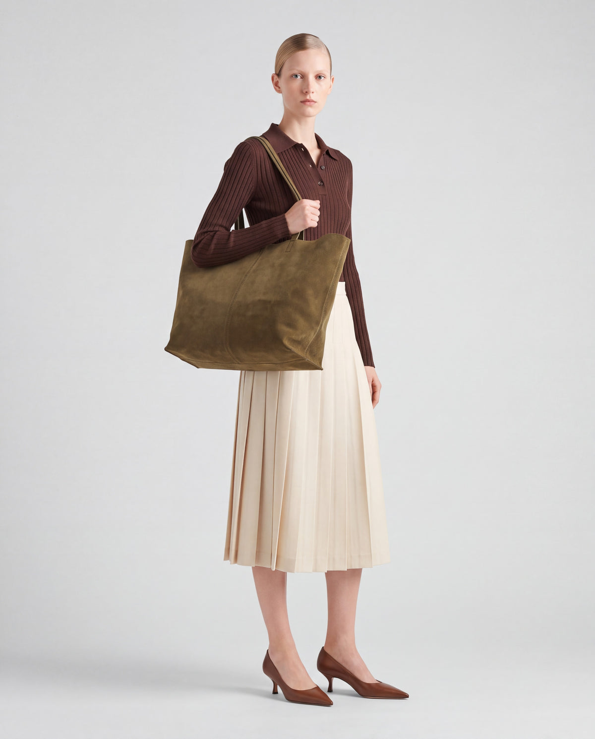 Bello bag in Olive – worn by model, full length