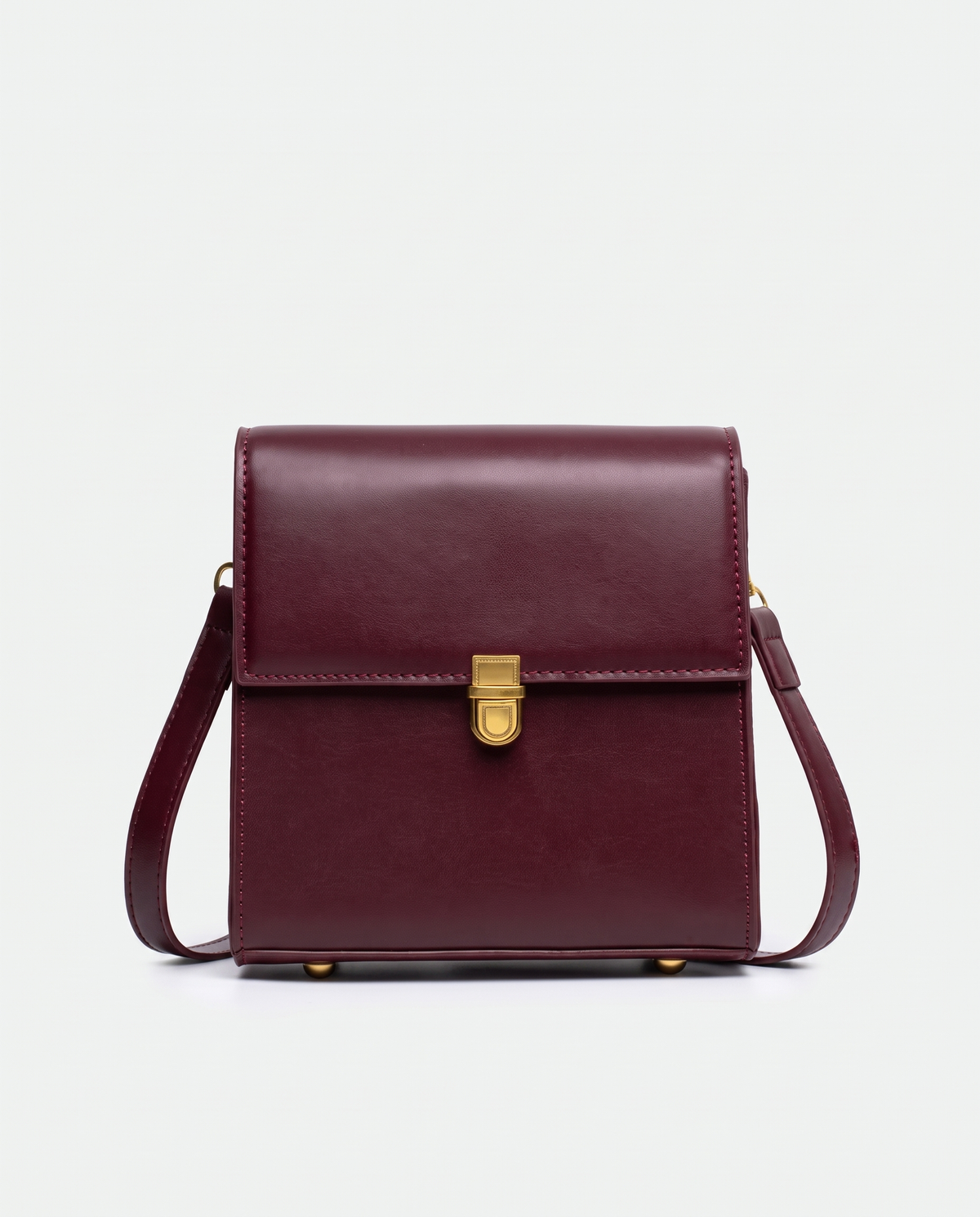 Bloc square vegan leather crossbody bag in Cherry – front view