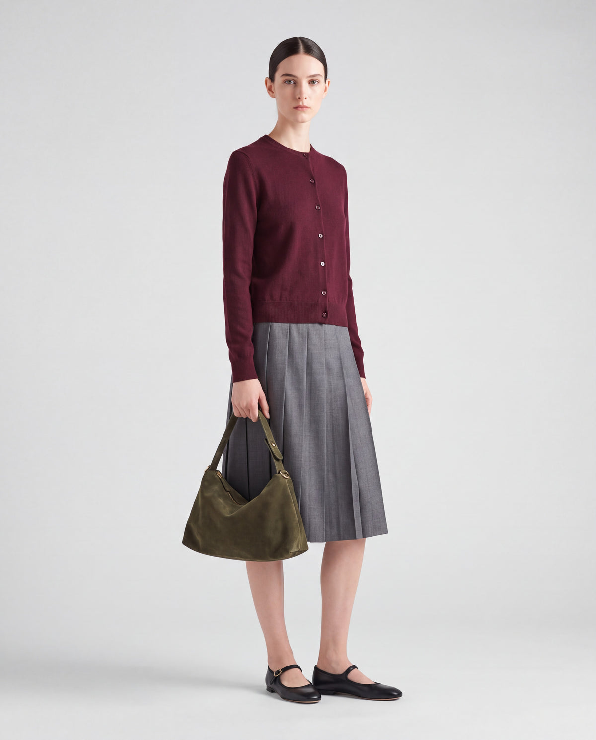 Calma bag in Green – worn by model, full length