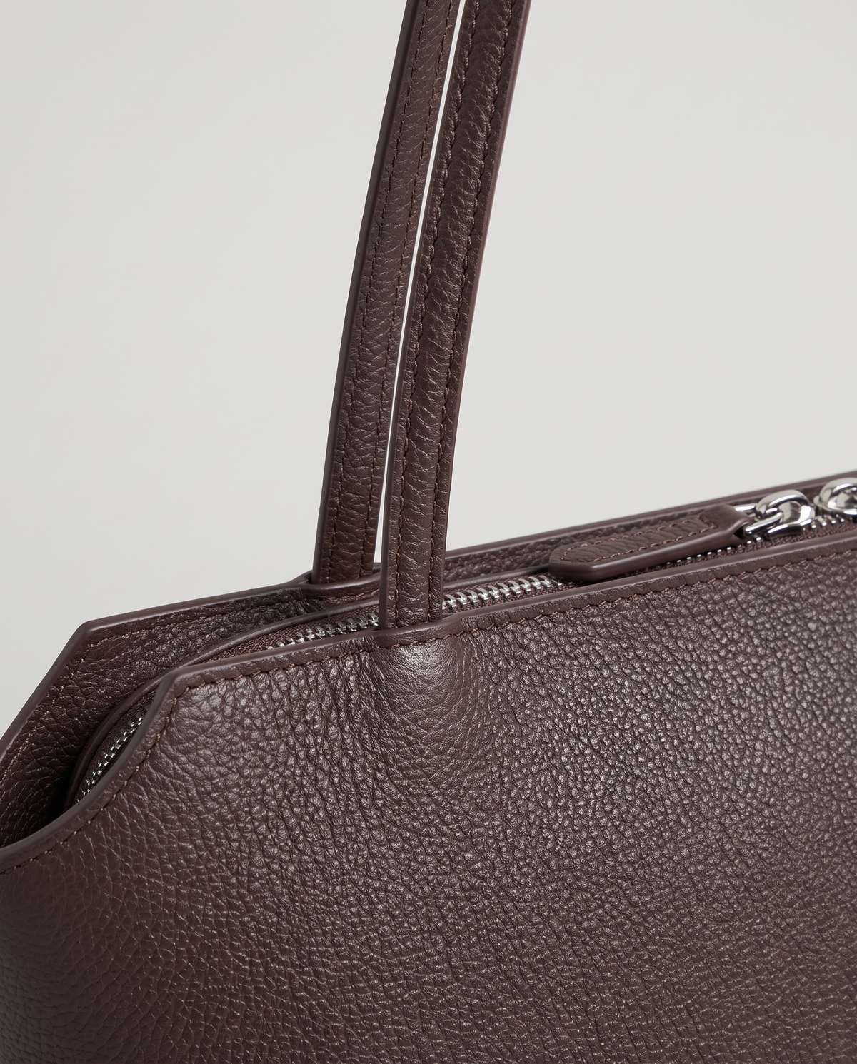 Capri leather shoulder bag in espresso, hardware and leather detail