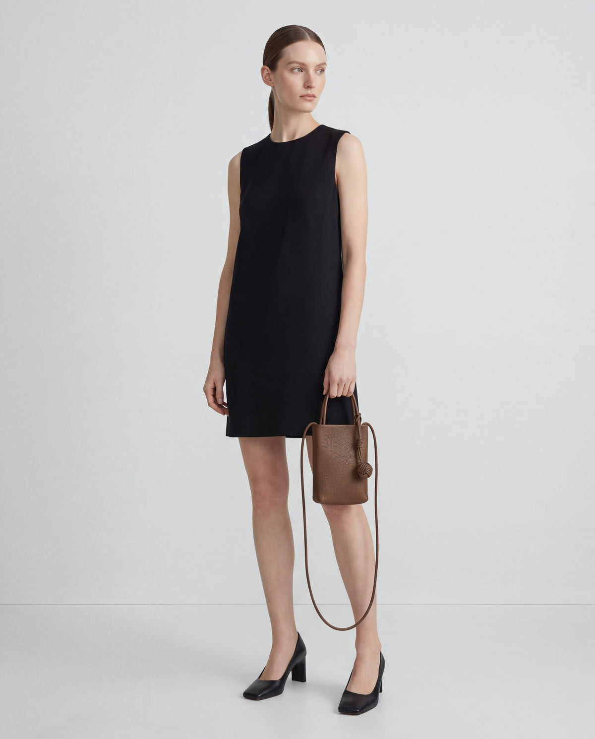 Cara bag in Brown – worn by model, full length