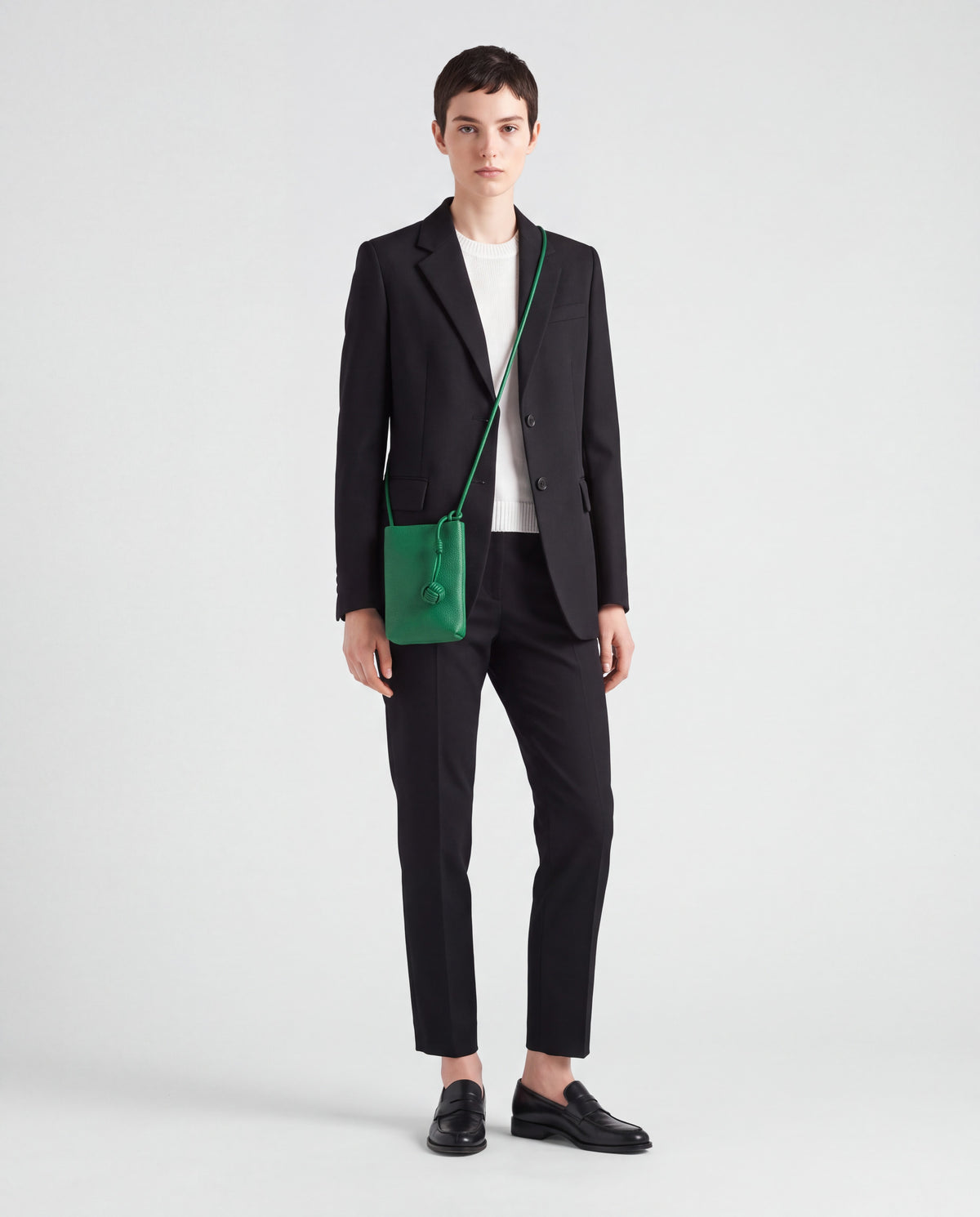 Cara bag in Emerald – worn by model, full length