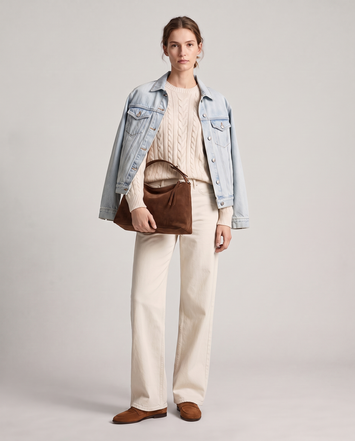 Model with the Cima suede shoulder bag in chocolate, full length