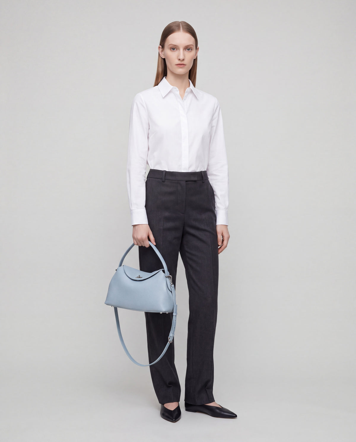 Corda bag in Sky – worn by model, full length