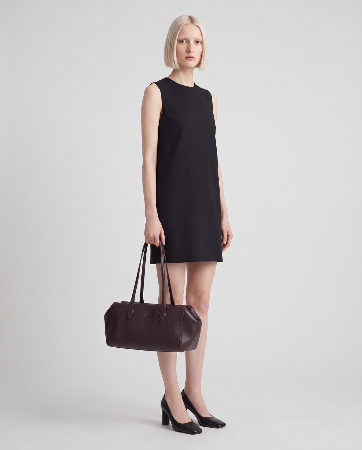 Cortina bag in Chocolate – worn by model, full length