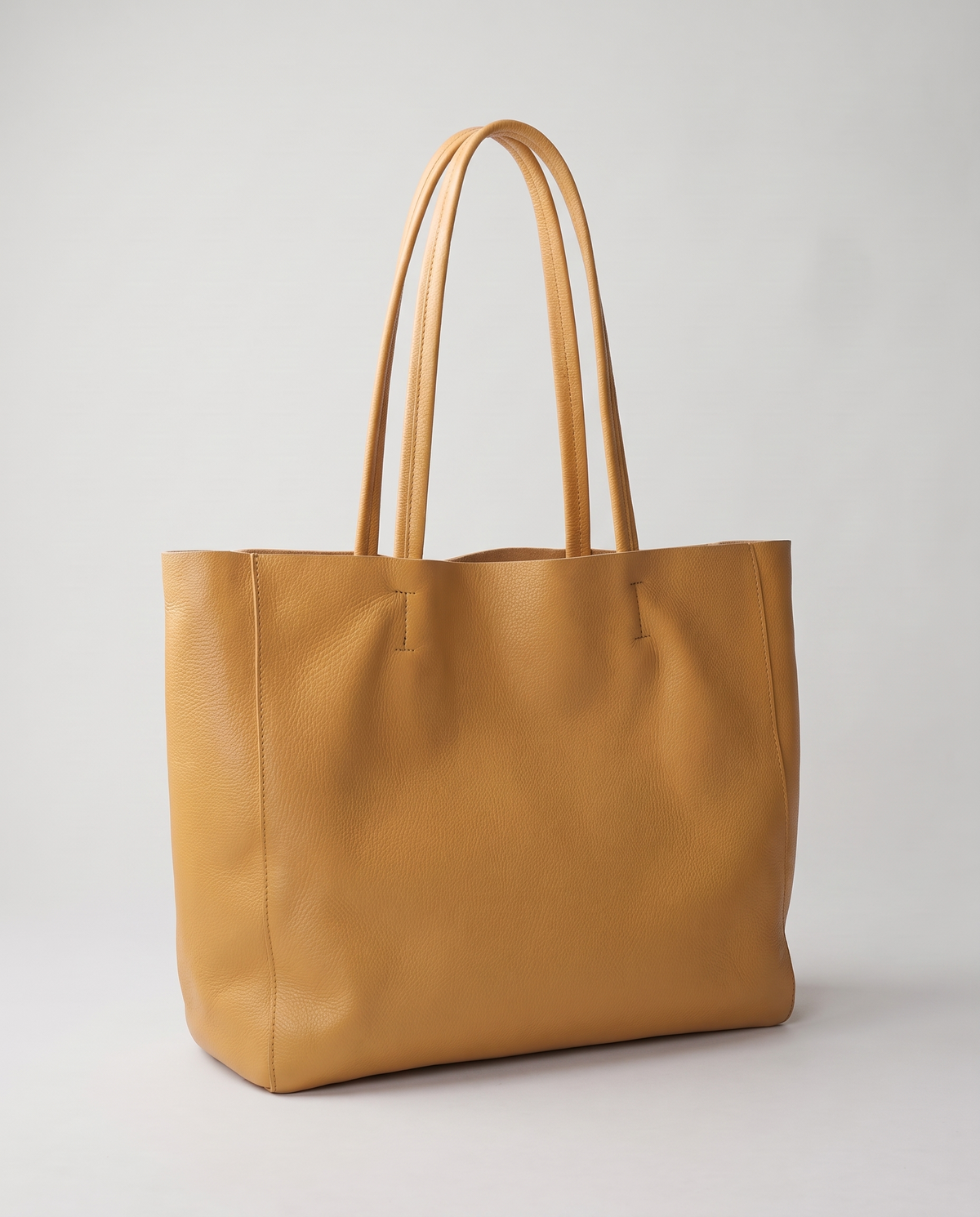 Costa leather tote in camel, three-quarter view