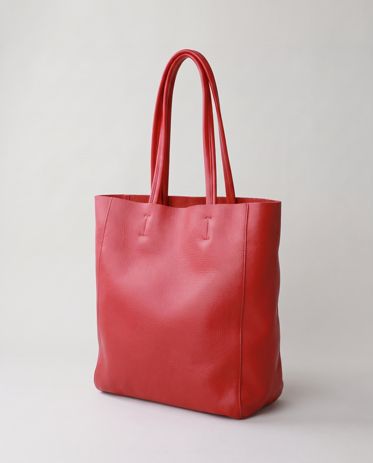 Costa leather tote in red, three-quarter view