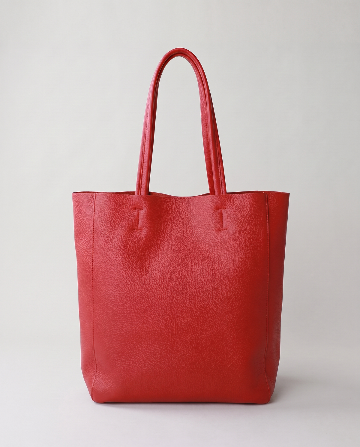 Costa leather tote in red, back view