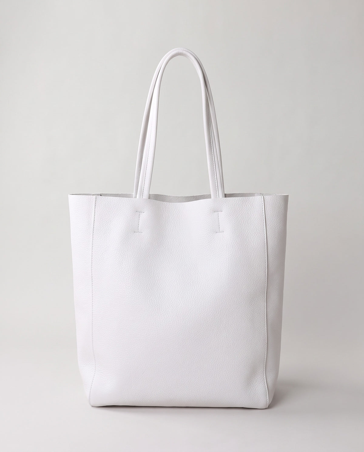 Costa leather tote in white, front view