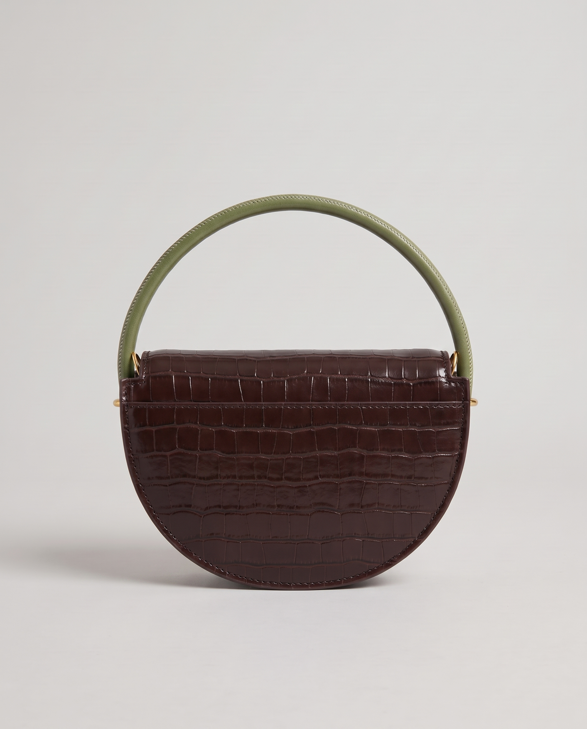 Crescent croc-embossed half-moon bag in Brown – back view