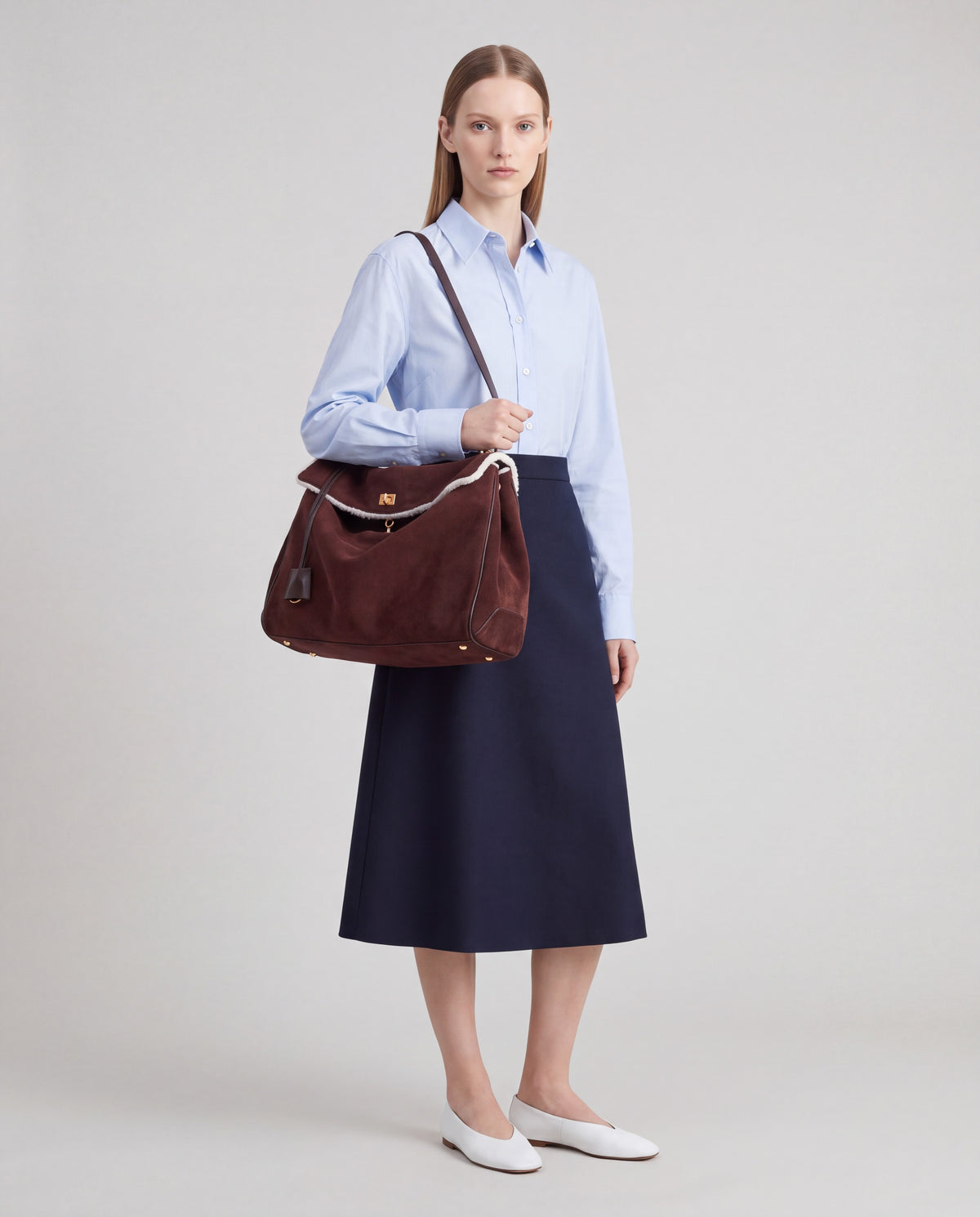 Dolce Small bag in Mahogany – worn by model, full length