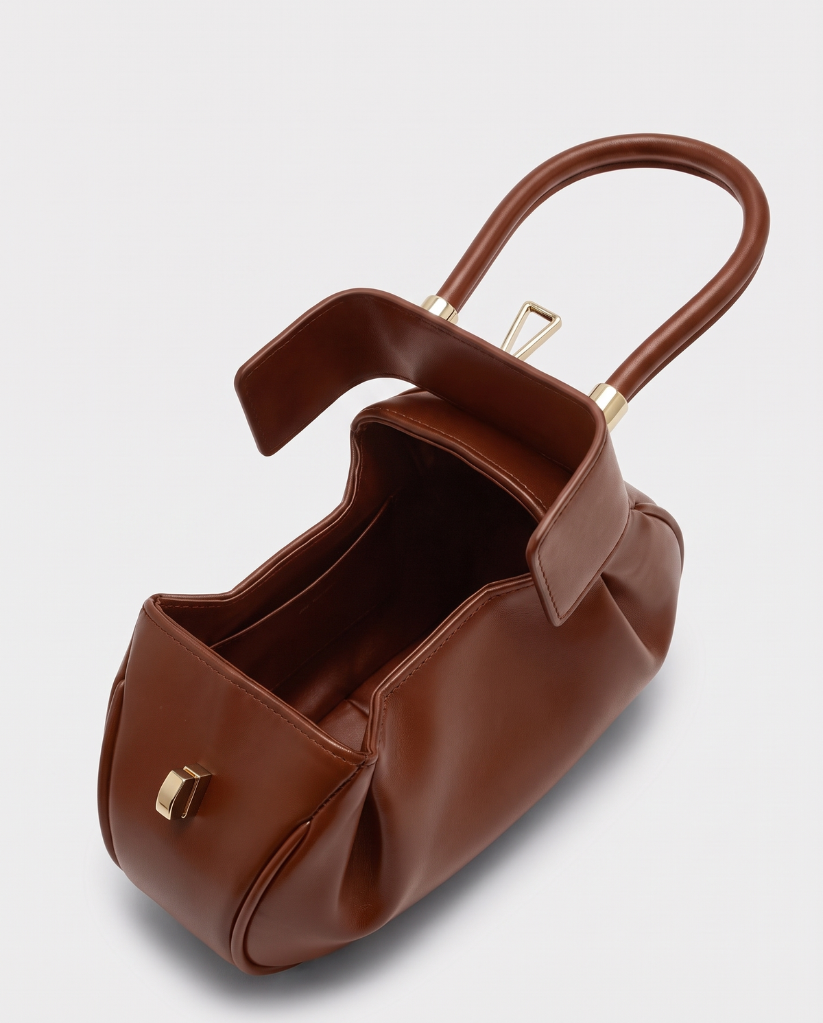 Dumpling Maxi leather top-handle bag in Brown – open, showing the leather-lined interior