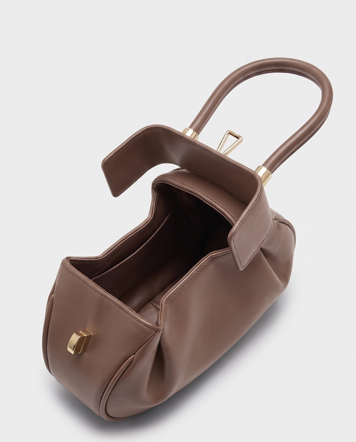 Dumpling Maxi leather top-handle bag in Nude – open, showing the leather-lined interior