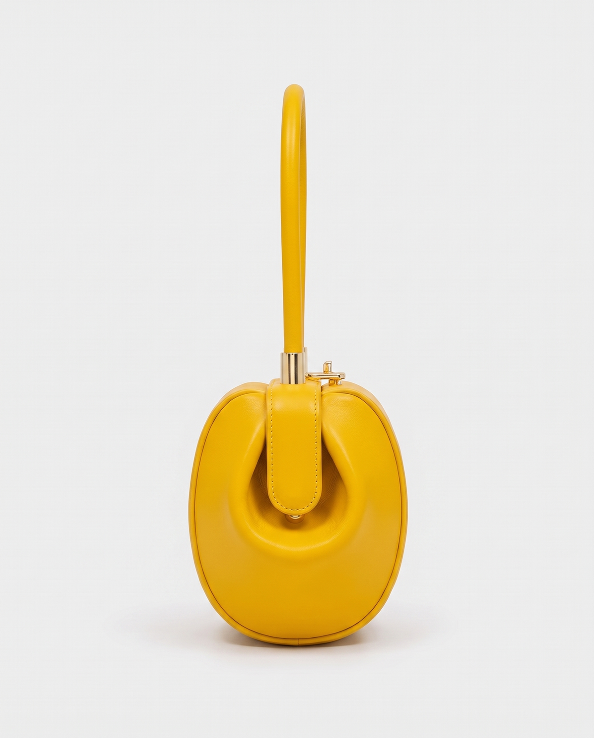 Dumpling Maxi leather top-handle bag in Yellow – side view