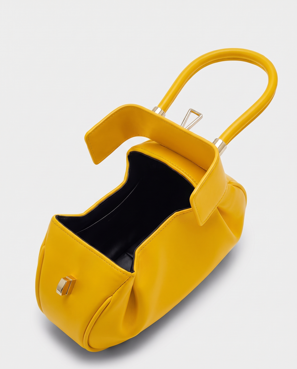 Dumpling Maxi leather top-handle bag in Yellow – open, showing the leather-lined interior