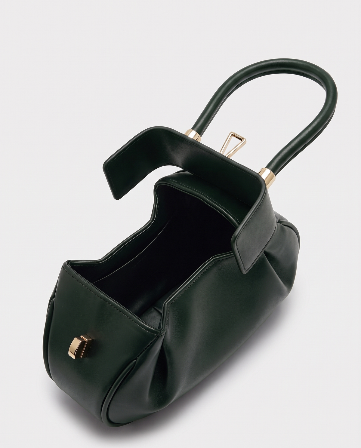 Dumpling Mini leather top-handle bag in Green – open, showing the leather-lined interior