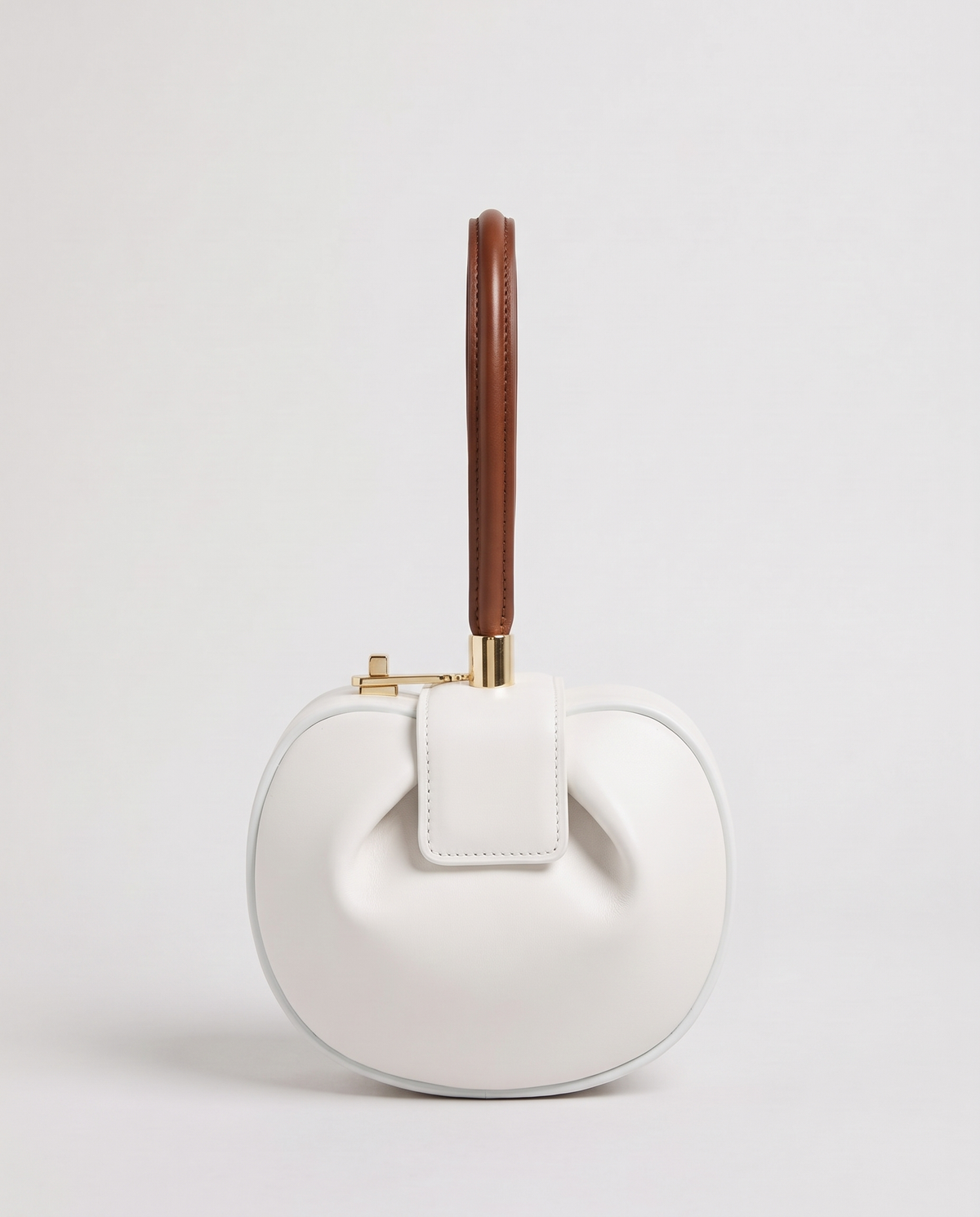 Dumpling Mini leather top-handle bag in White – front view