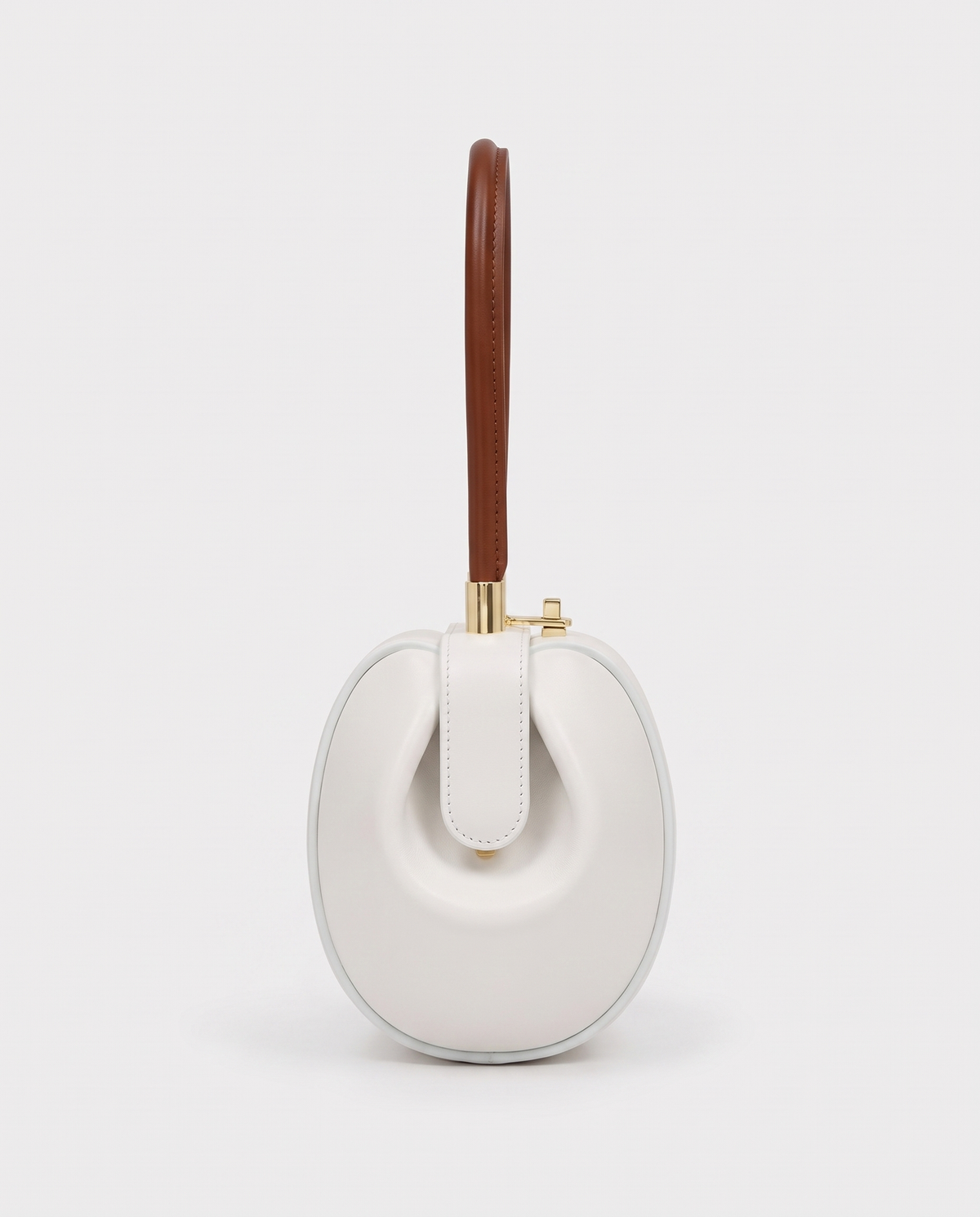 Dumpling Mini leather top-handle bag in White – side view