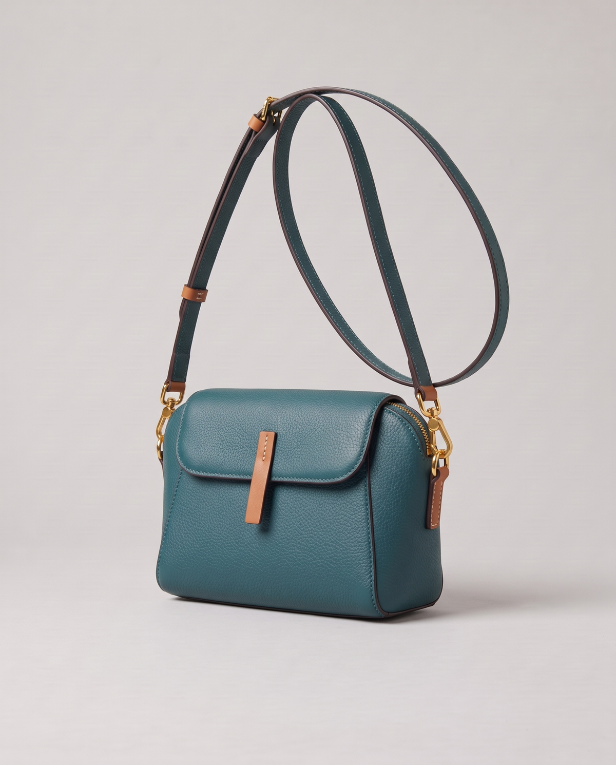 Elara mini leather crossbody in Teal – three-quarter view