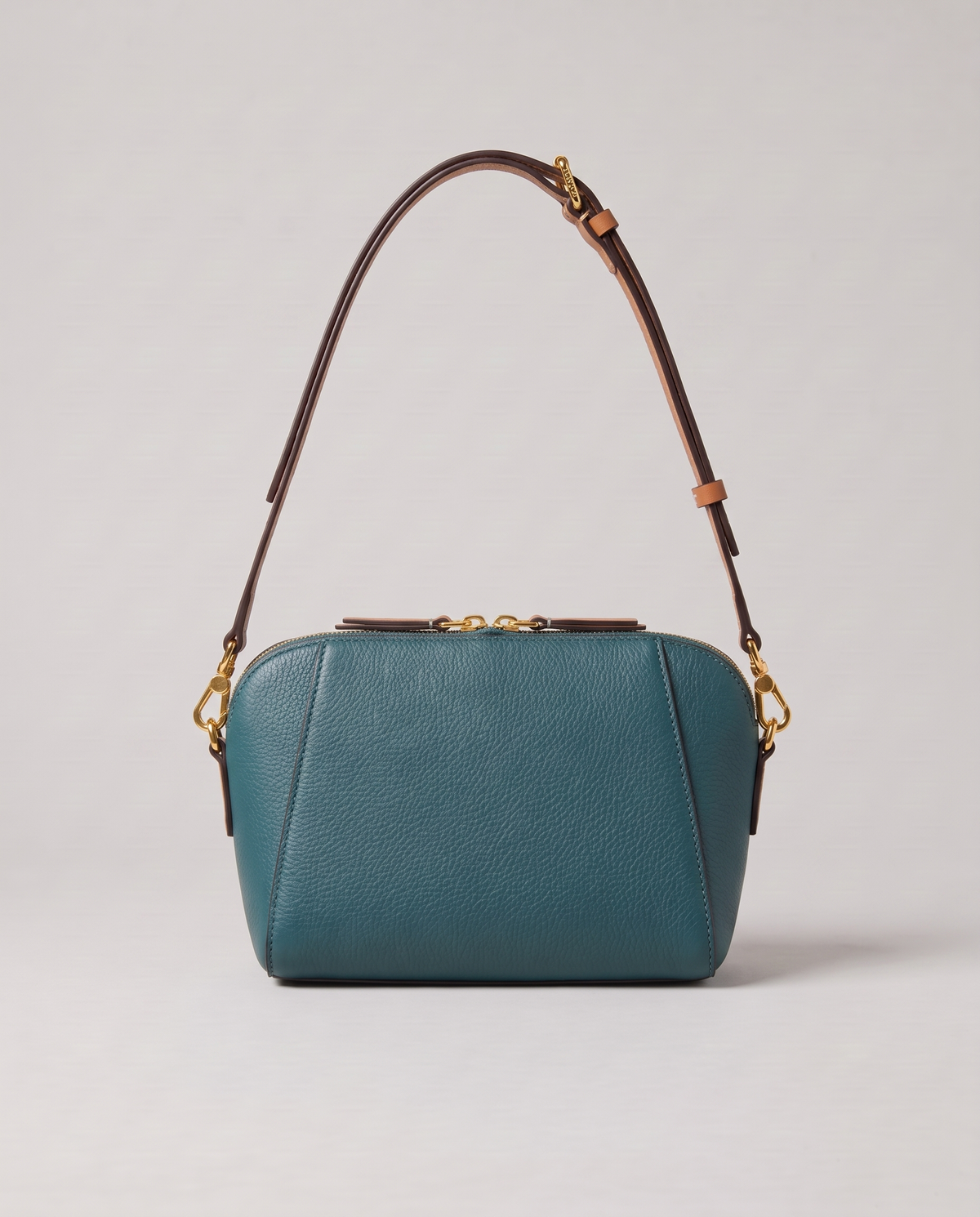 Elara mini leather crossbody in Teal – back view
