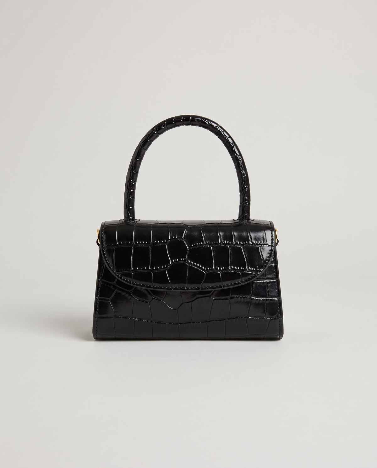 Fern mini croc top-handle bag in Black – front view