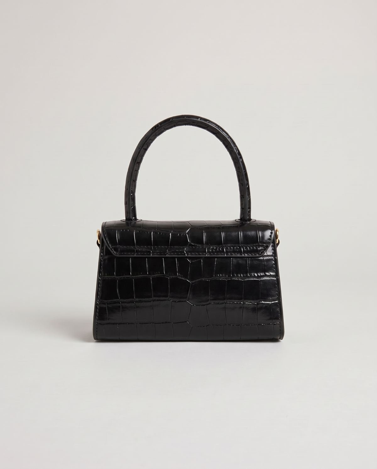Fern mini croc top-handle bag in Black – back view
