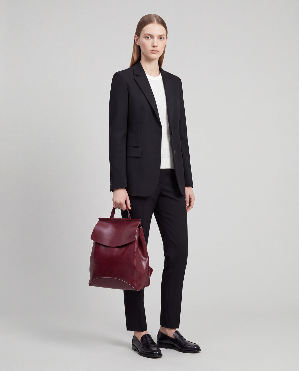 Forma bag in Red – worn by model, full length
