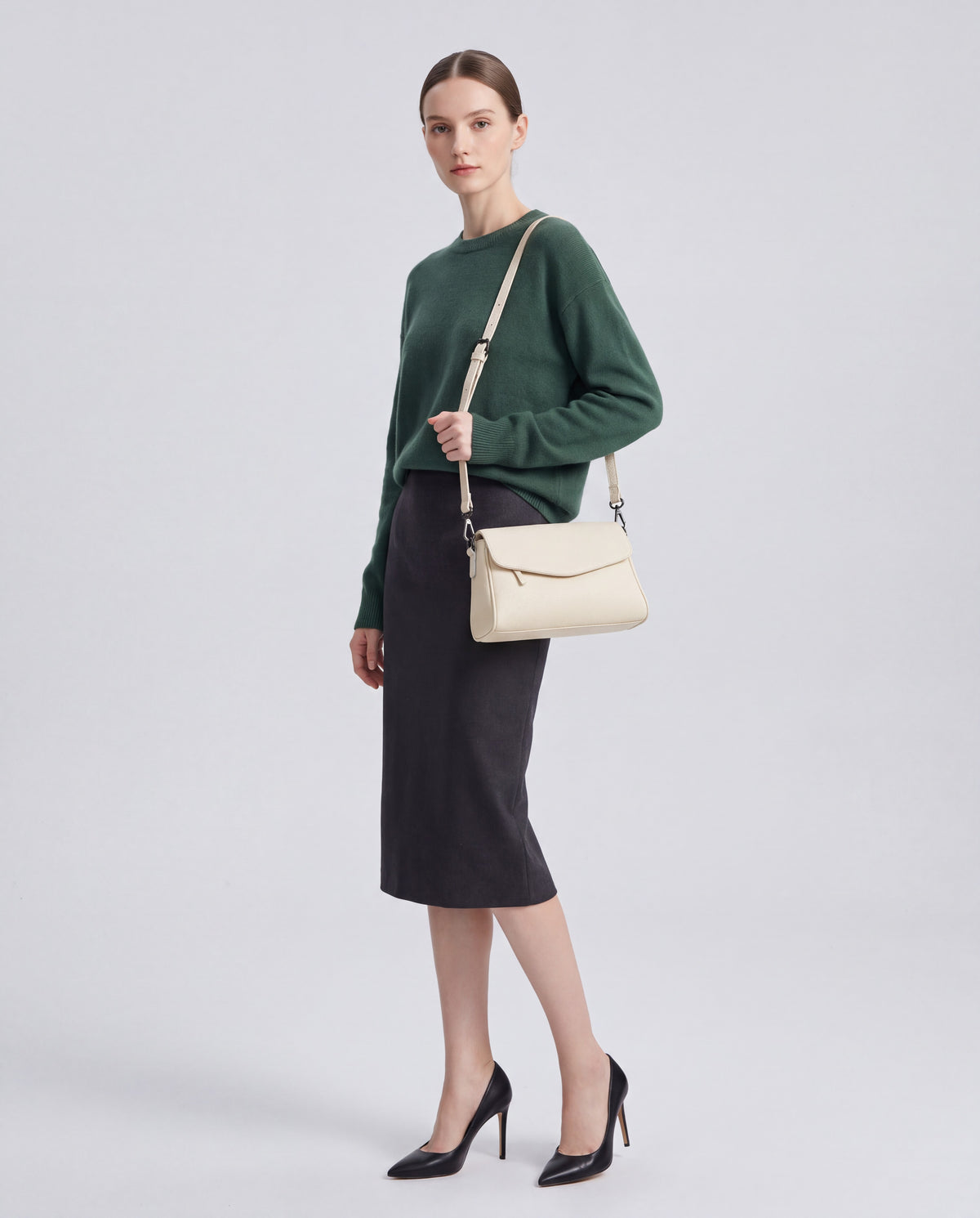 Fumo bag in Ivory – worn by model, full length
