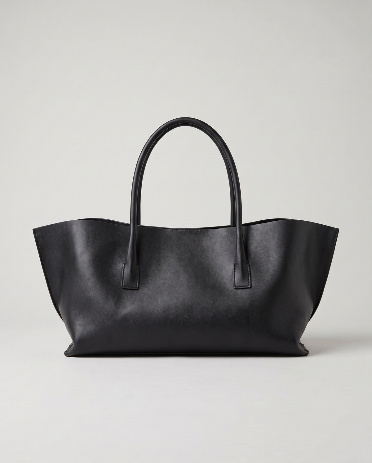 Gaia leather tote in black, back view