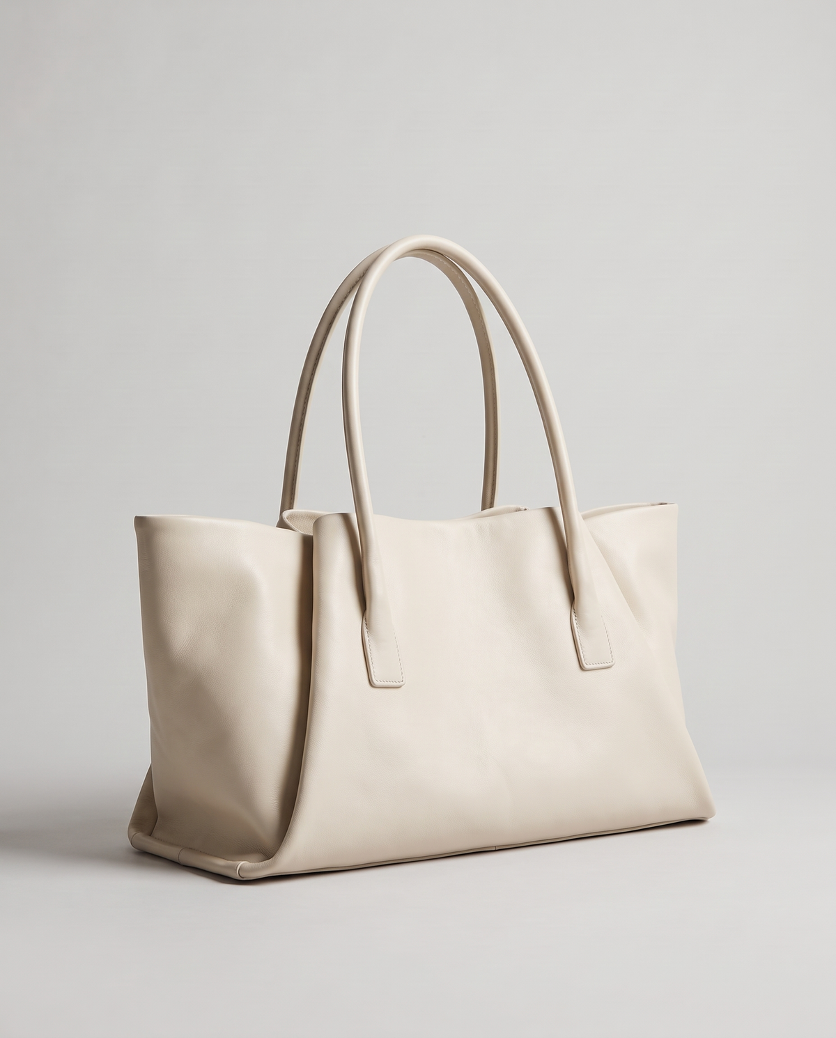 Gaia leather tote in ivory, three-quarter view