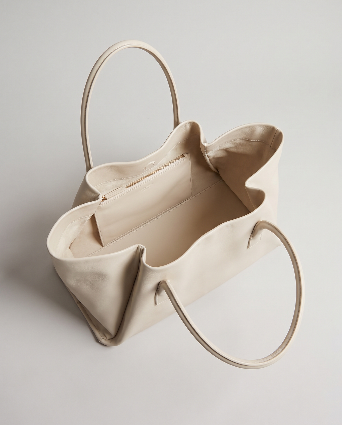 Gaia leather tote in ivory, open showing interior