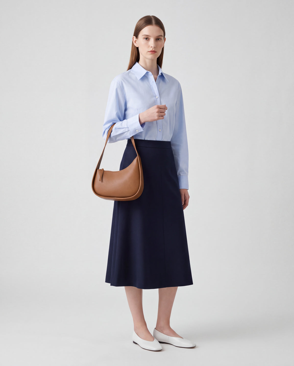 Muse bag in Caramel – worn by model, full length