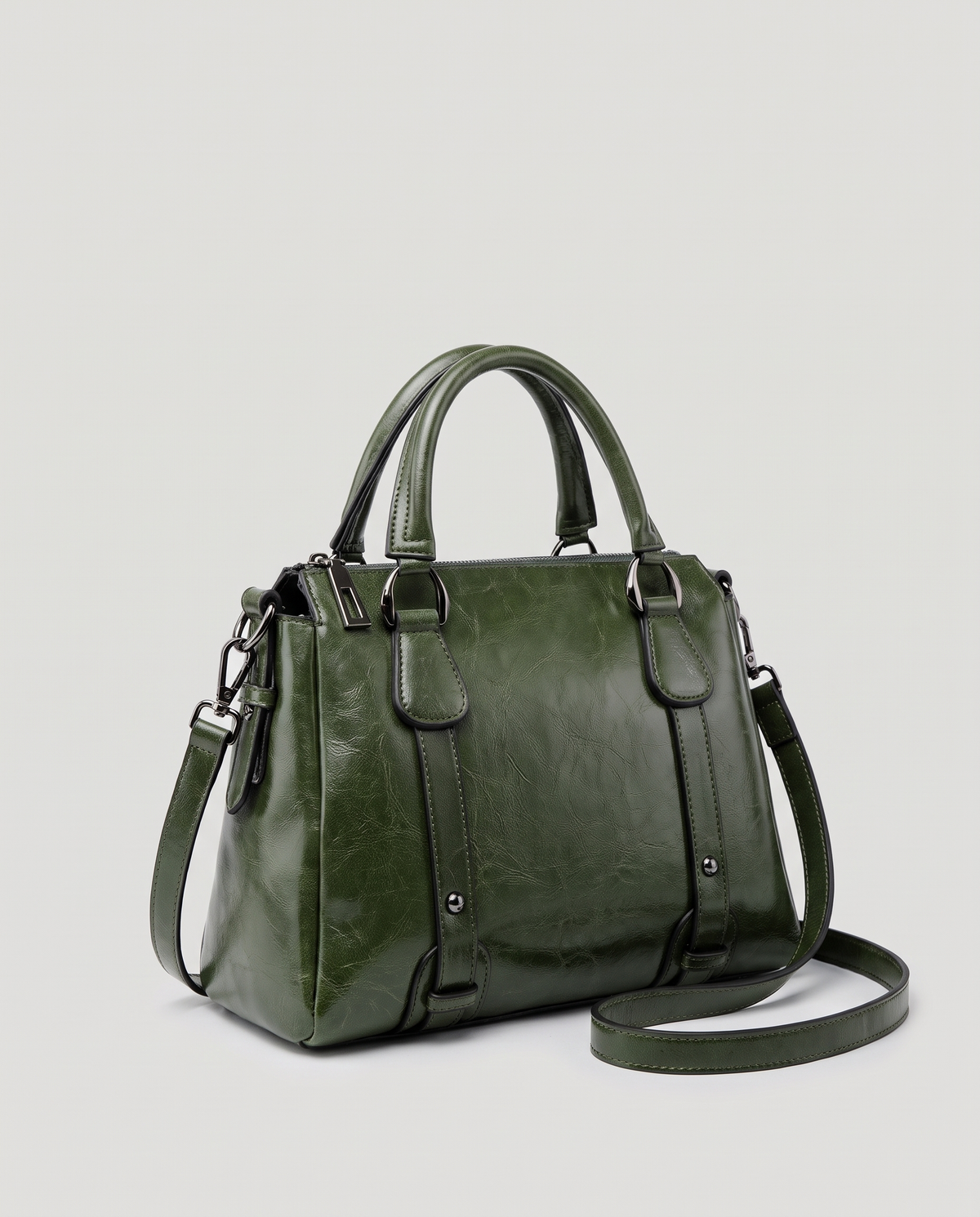 Harlow leather handbag in Green – three-quarter view with the shoulder strap attached