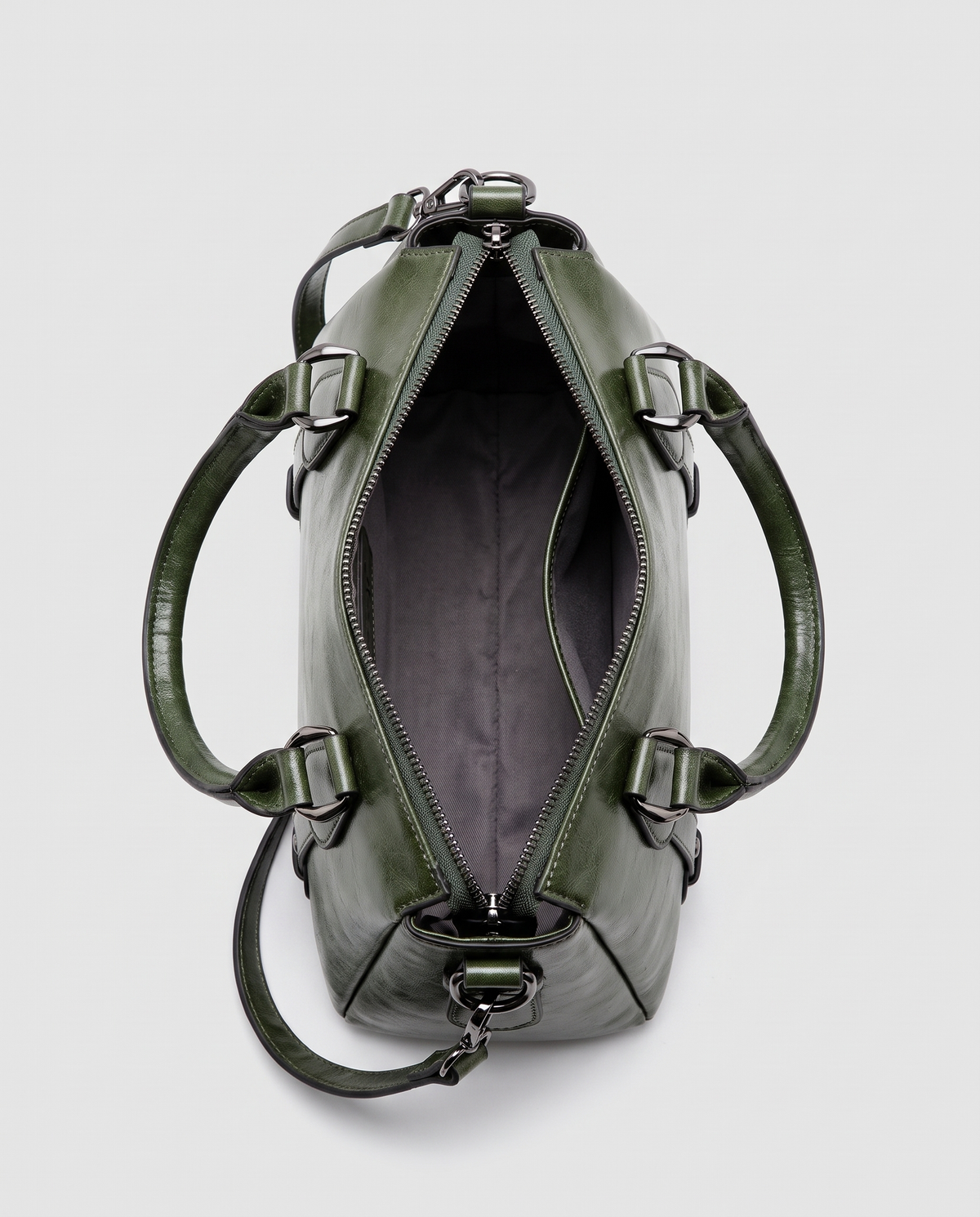 Harlow leather handbag in Green – view from above with the zip open, showing the lined interior