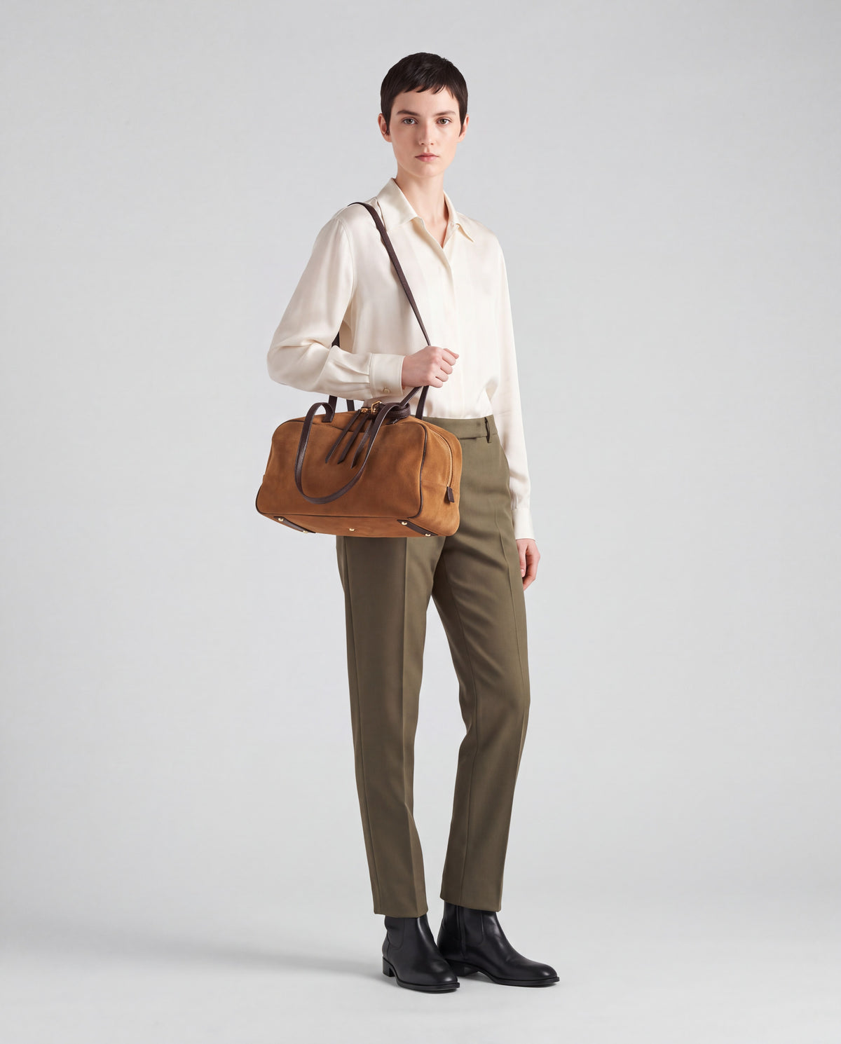 Haven bag in Tan – worn by model, full length