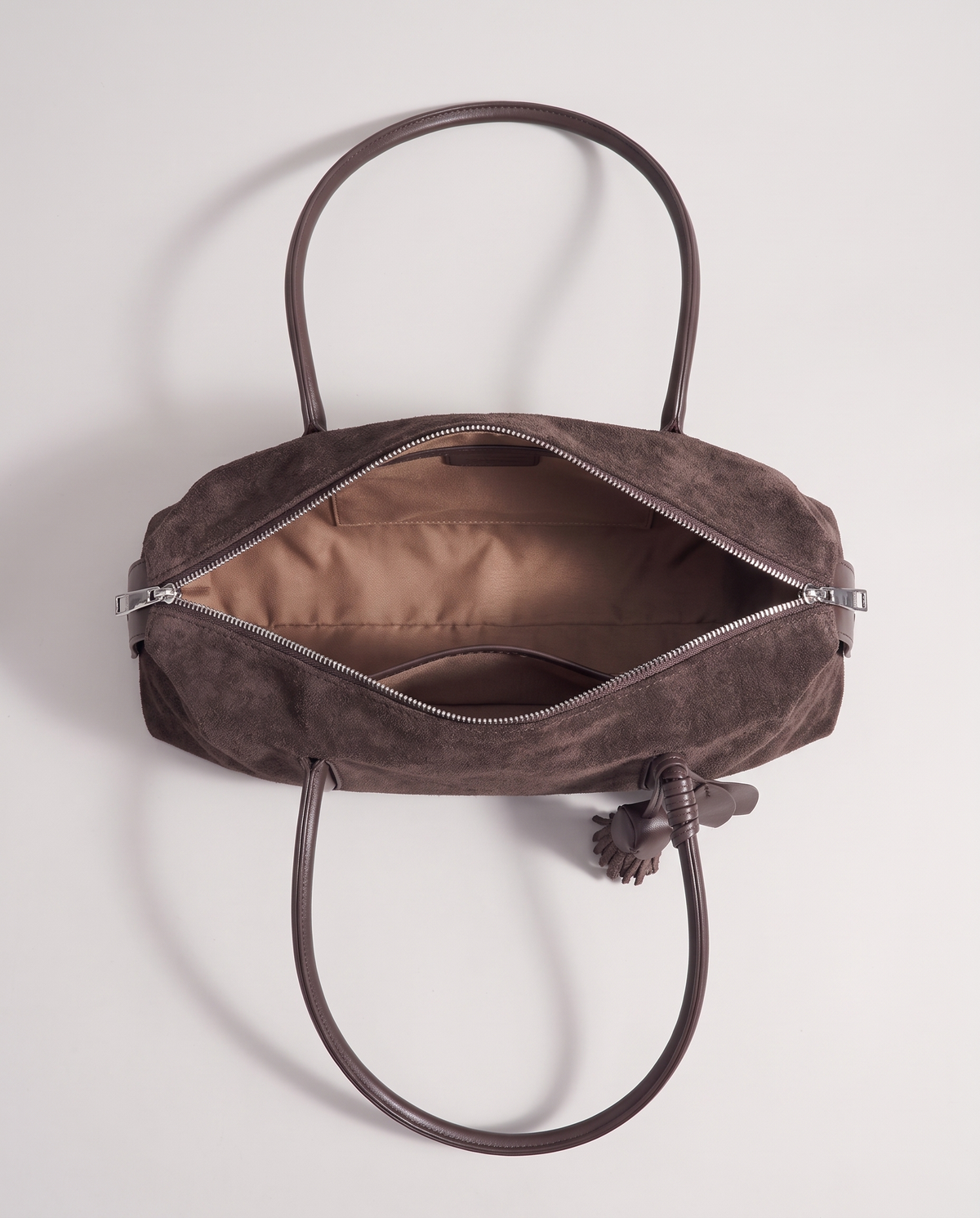Isola suede shoulder bag in mocha, open showing interior