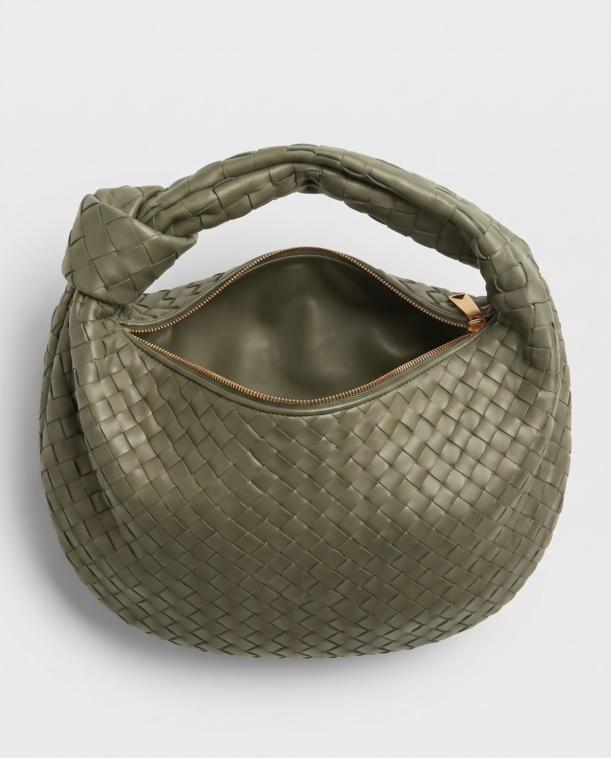 Knot Midi woven leather bag in Sage – inside view with the zip open